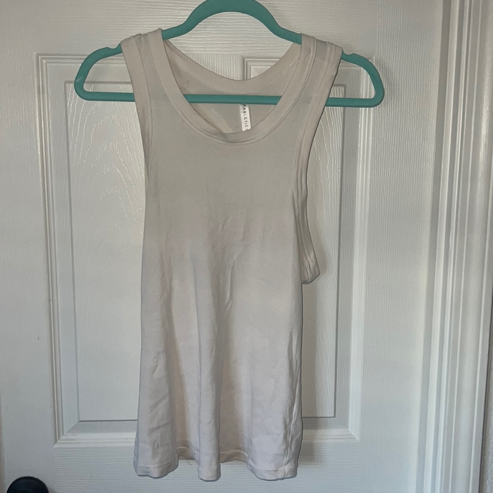 Off white Fabletics tank top. Super comfy to workout in. Worn only a few times